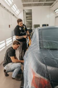 car being prepped for paint job