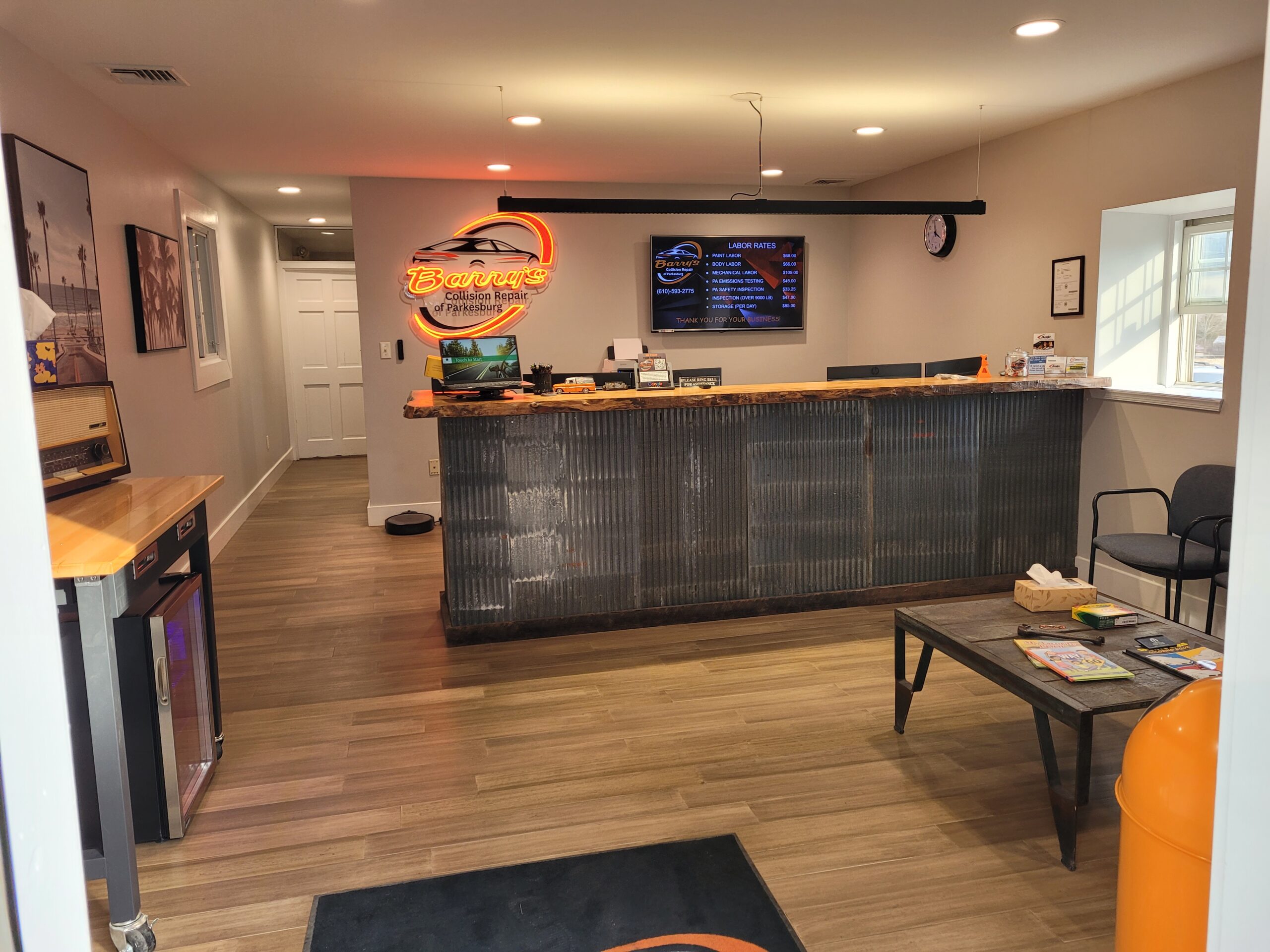 Barry's Collision Repair of Parkesburg facility interior with reception desk and signage.